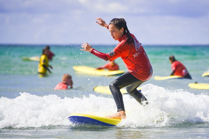 Beginner Surf Lesson in Newquay, Cornwall - Changing into a proper beginner setup