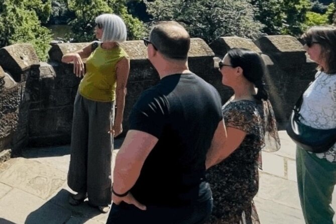 Chester Food Tour: Unique Food With Drinks & Sightseeing - Eastgate Clock and a Café on Chester’s Walls