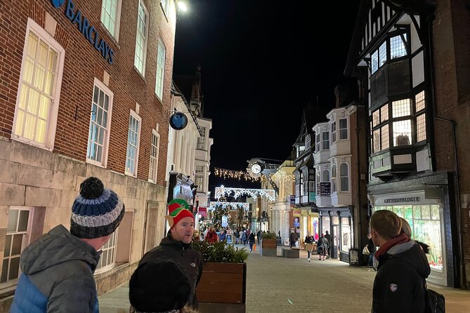 Christmas Mulled Wine Walk of Winchester - A Victorian building lit for the season