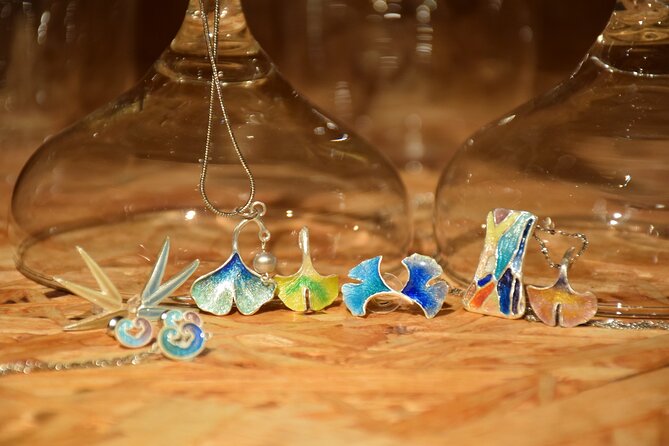 Enamel Jewellery Making Class in London - Applying enamel powder with personal guidance