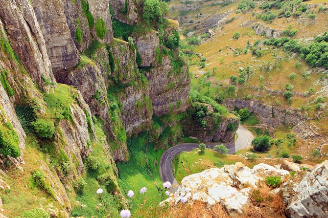 Glastonbury and Cheddar Gorge Guided Day Tour from London - Cheddar Gorge: cliffs, caves, and real cheddar