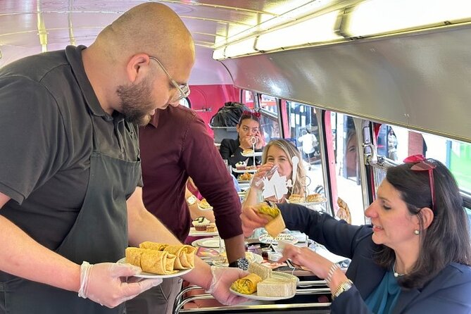 "Here We Go Again" London Afternoon Tea Bus - Tea, cake, and a glass of Prosecco