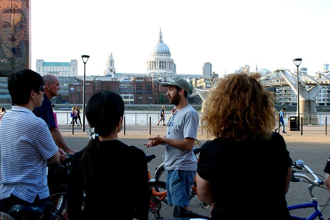 Highlights of Royal London Bike Tour with River Cruise Package - Crossing Tower Bridge by bicycle