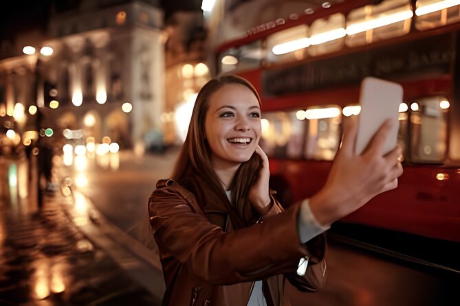 London by Night Walking Tour with Christmas Lights - Leicester Square and the Swiss Glockenspiel keep the route lively