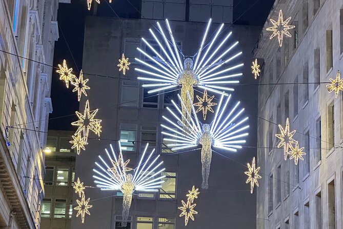 London Christmas Lights Guided Tour With Christmas Music - Seven Dials and its canopy of lights