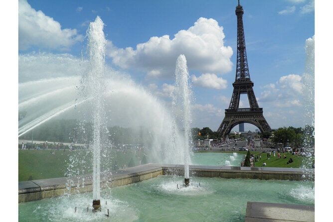 Paris by Rail with Sightseeing Bus and River Seine Lunch Cruise - The Eiffel Tower photo stop
