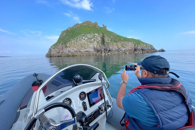 Private Coastal Boat Tour in Torquay - Weather, clothing, and comfort on the RIB