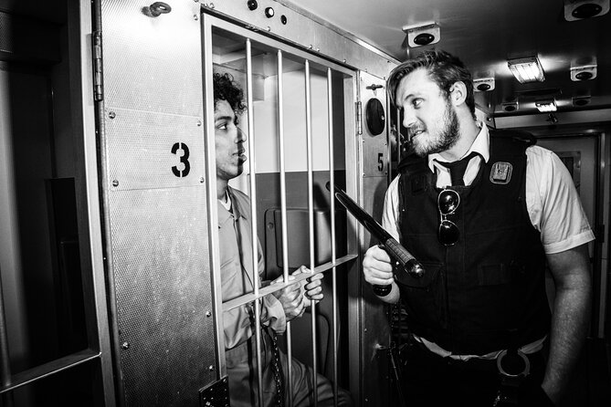 Private Prison Van Escape Game - London Immersive Experience - Orange Uniforms, Handcuffs, and the Opening Setup